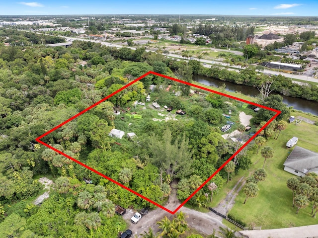 69 Armadillo Way, West Palm Beach, FL 33411 - aerial view of property's location with property parcel outlined and a large body of water