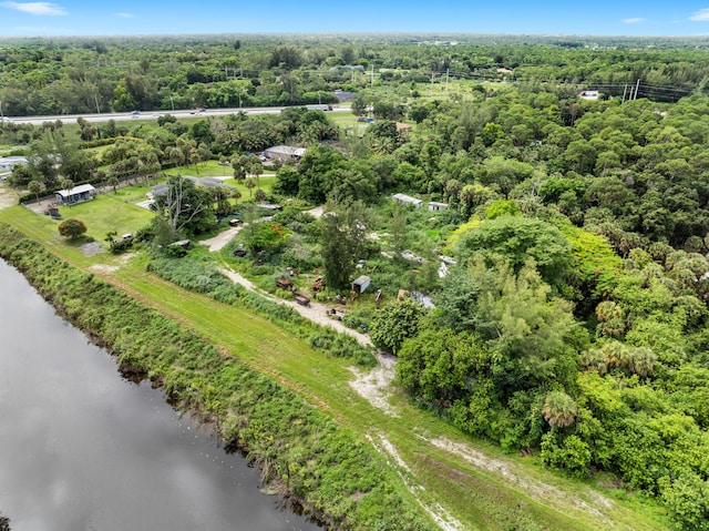 69 Armadillo Way, West Palm Beach, FL 33411 - aerial view of a nearby body of water and a forest