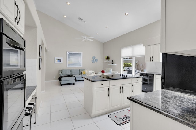 6179 Evian Pl, Boynton Beach, FL 33437 - kitchen with black appliances, ceiling fan, backsplash, high vaulted ceiling, and recessed lighting