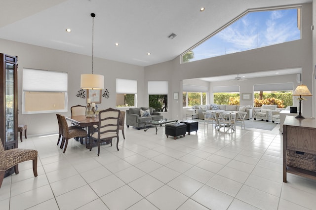 6179 Evian Pl, Boynton Beach, FL 33437 - dining area featuring light tile patterned floors, high vaulted ceiling, and recessed lighting