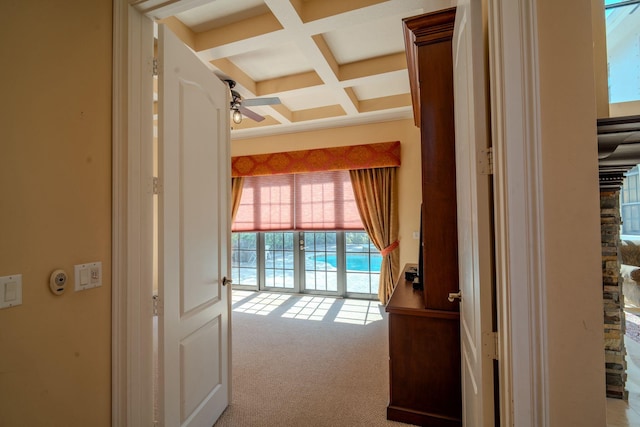 8979 Three Rail Dr, Boynton Beach, FL 33472 - hall with coffered ceiling, beamed ceiling, and carpet flooring