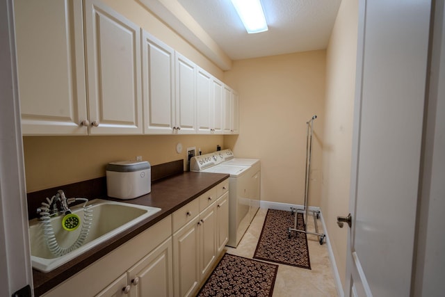 8979 Three Rail Dr, Boynton Beach, FL 33472 - laundry room with cabinet space, washer and clothes dryer, and baseboards