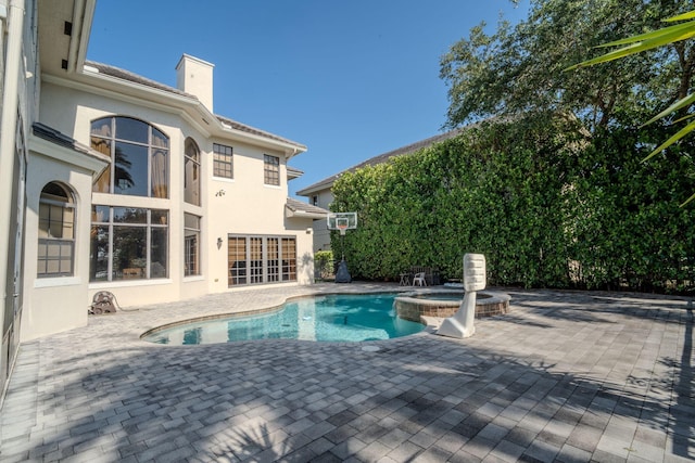 8979 Three Rail Dr, Boynton Beach, FL 33472 - view of pool featuring a patio area and a pool with connected hot tub