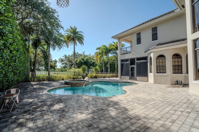 8979 Three Rail Dr, Boynton Beach, FL 33472 - view of pool with a patio area, a fenced backyard, and a pool with connected hot tub