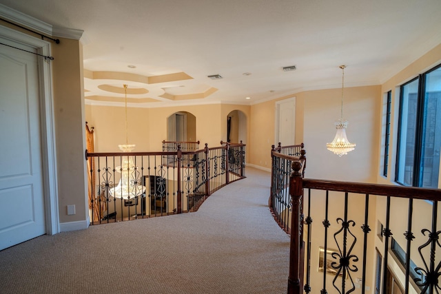 8979 Three Rail Dr, Boynton Beach, FL 33472 - corridor featuring an upstairs landing, a chandelier, carpet, crown molding, and baseboards