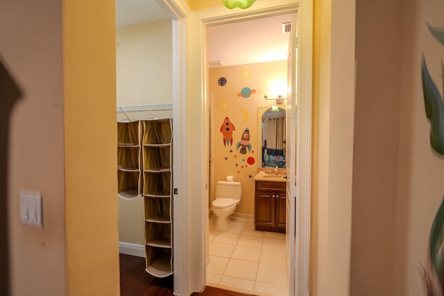 8979 Three Rail Dr, Boynton Beach, FL 33472 - hall featuring a sink and tile patterned floors