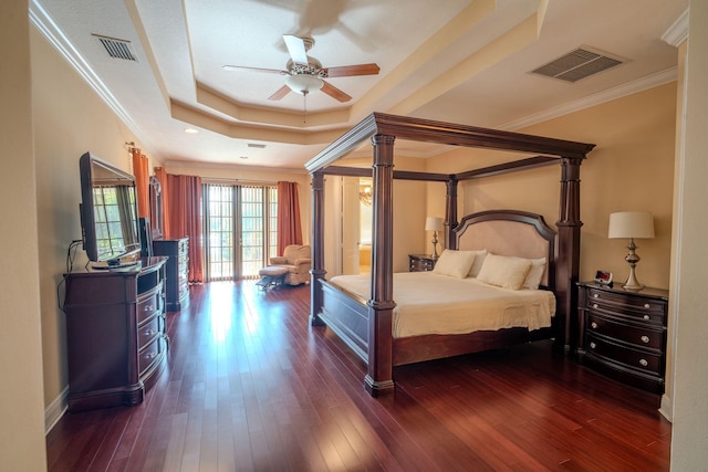 8979 Three Rail Dr, Boynton Beach, FL 33472 - bedroom featuring a tray ceiling, dark wood finished floors, ornamental molding, baseboards, and ceiling fan
