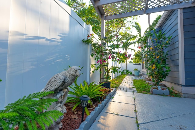 1325 Strawberry Ln, West Palm Beach, FL 33415 - view of patio featuring a pergola