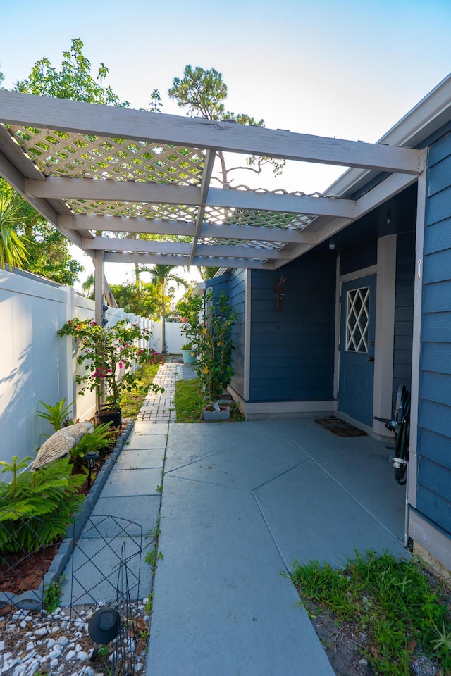 1325 Strawberry Ln, West Palm Beach, FL 33415 - view of parking featuring a fenced backyard