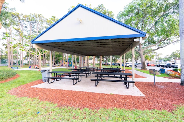 1325 Strawberry Ln, West Palm Beach, FL 33415 - surrounding community with a gazebo and a lawn