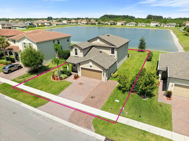 852 Gairloch Ln, Fort Pierce, FL 34947 - aerial perspective of suburban area with a nearby body of water and property boundaries highlighted