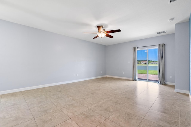 852 Gairloch Ln, Fort Pierce, FL 34947 - spare room featuring ceiling fan, baseboards, and light tile patterned flooring