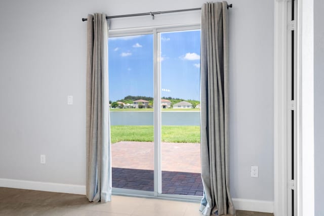852 Gairloch Ln, Fort Pierce, FL 34947 - entryway featuring a water view and baseboards