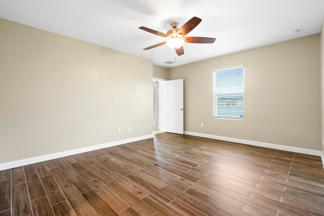 852 Gairloch Ln, Fort Pierce, FL 34947 - spare room with wood finished floors, a ceiling fan, baseboards, and a smoke detector