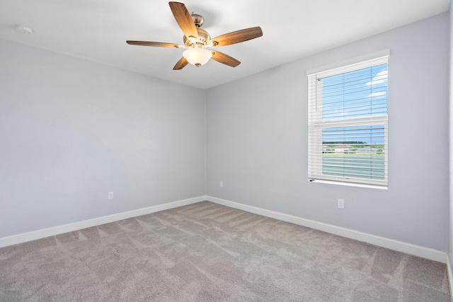 852 Gairloch Ln, Fort Pierce, FL 34947 - carpeted empty room with a ceiling fan and baseboards