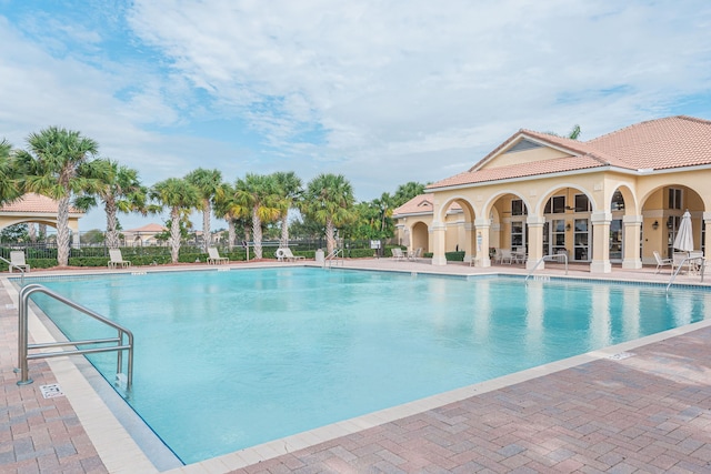 852 Gairloch Ln, Fort Pierce, FL 34947 - community pool featuring a patio area