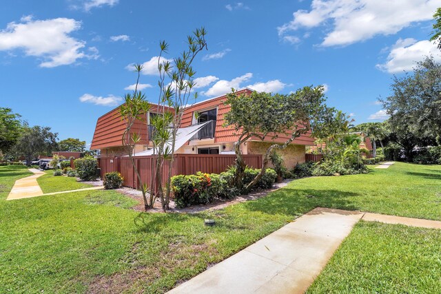 2938 SW 12th St, Deerfield Beach, FL 33442 - view of side of home with mansard roof