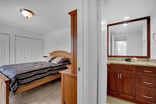 2938 SW 12th St, Deerfield Beach, FL 33442 - bedroom with light carpet, recessed lighting, and a sink