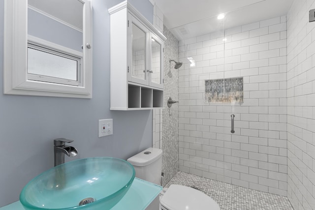 454 Tequesta Dr, Tequesta, FL 33469 - full bathroom featuring a sink, a stall shower, toilet, and crown molding