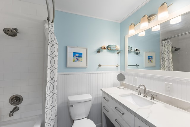 454 Tequesta Dr, Tequesta, FL 33469 - bathroom with toilet, vanity, a wainscoted wall, shower / tub combo with curtain, and ornamental molding