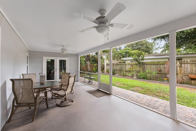 454 Tequesta Dr, Tequesta, FL 33469 - sunroom with french doors, ceiling fan, and outdoor dining area