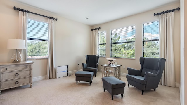 8520 Lewis River Rd, Delray Beach, FL 33446 - living area with healthy amount of natural light, light colored carpet, and baseboards