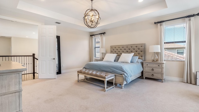 8520 Lewis River Rd, Delray Beach, FL 33446 - bedroom featuring a tray ceiling, light carpet, a chandelier, and recessed lighting