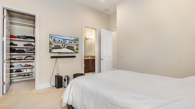 8520 Lewis River Rd, Delray Beach, FL 33446 - bedroom featuring a walk in closet, light colored carpet, baseboards, a closet, and ensuite bath