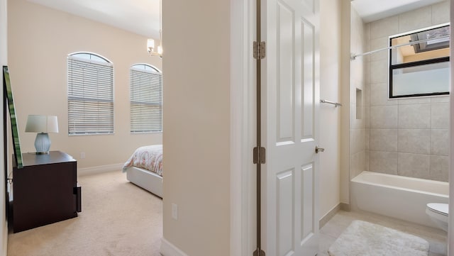 8520 Lewis River Rd, Delray Beach, FL 33446 - full bathroom with connected bathroom, shower / bath combination, baseboards, toilet, and a chandelier