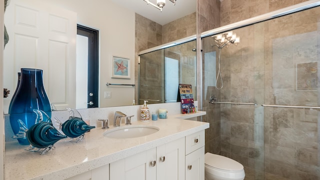 8520 Lewis River Rd, Delray Beach, FL 33446 - full bathroom with a stall shower, toilet, and vanity