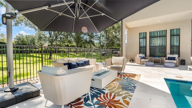 8520 Lewis River Rd, Delray Beach, FL 33446 - view of patio / terrace with an outdoor living space with a fire pit