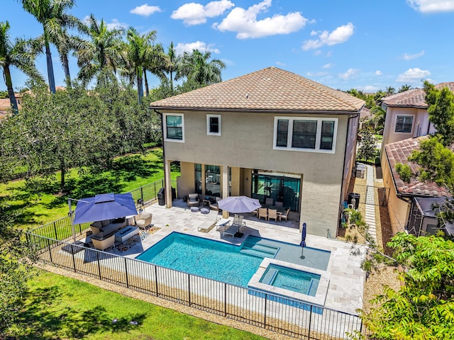 8520 Lewis River Rd, Delray Beach, FL 33446 - back of property with stucco siding, a fenced backyard, outdoor lounge area, a tiled roof, and a patio