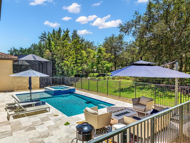 8520 Lewis River Rd, Delray Beach, FL 33446 - view of pool featuring a patio, a fenced backyard, and a pool with connected hot tub
