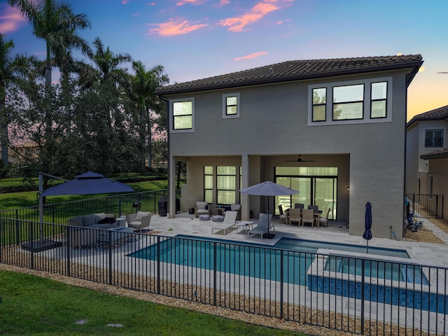 8520 Lewis River Rd, Delray Beach, FL 33446 - view of swimming pool featuring outdoor lounge area, a ceiling fan, and a patio area