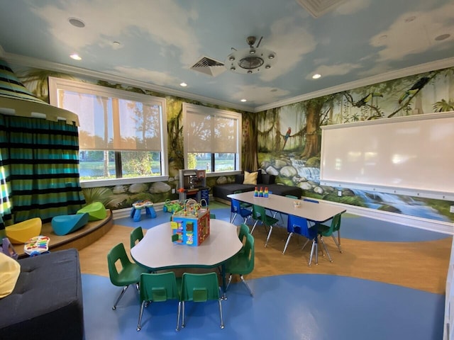 8520 Lewis River Rd, Delray Beach, FL 33446 - playroom featuring crown molding, wallpapered walls, wood finished floors, and recessed lighting