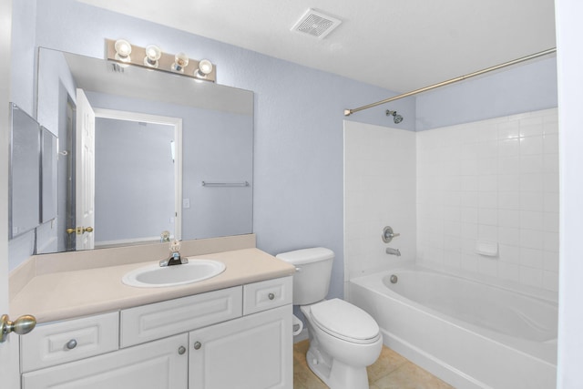 174 SE Kitching Cir Unit 174, Stuart, FL 34994 - bathroom featuring toilet, vanity, tile patterned floors, and bathtub / shower combination
