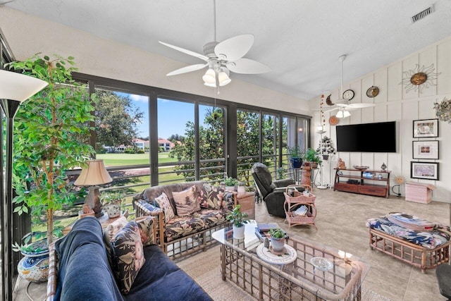 5846 NW 24th Ave Unit 202, Boca Raton, FL 33496 - living room featuring ceiling fan and lofted ceiling