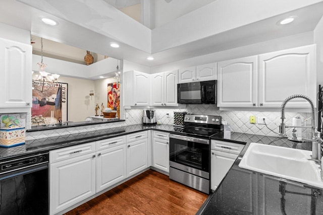5846 NW 24th Ave Unit 202, Boca Raton, FL 33496 - kitchen featuring black appliances, a sink, recessed lighting, white cabinetry, and dark wood-type flooring