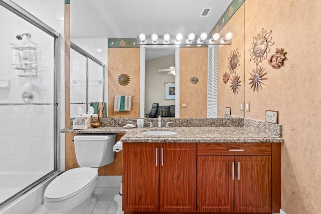 5846 NW 24th Ave Unit 202, Boca Raton, FL 33496 - bathroom featuring a shower stall, toilet, a ceiling fan, vanity, and tile patterned floors