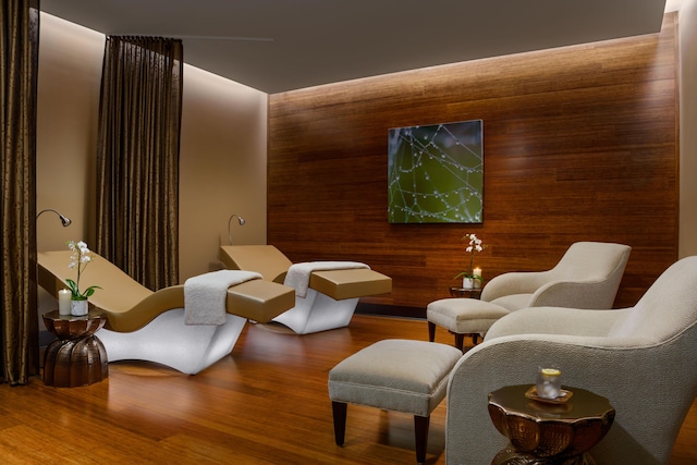 5846 NW 24th Ave Unit 202, Boca Raton, FL 33496 - living area featuring wood finished floors and wooden walls