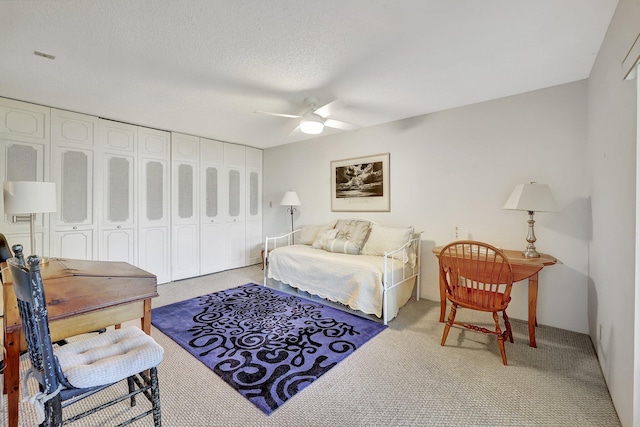 1800 SE Saint Lucie Blvd Unit 2-204, Stuart, FL 34996 - bedroom with light carpet, ceiling fan, and a closet