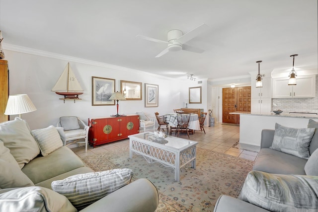 1800 SE Saint Lucie Blvd Unit 2-204, Stuart, FL 34996 - living room with crown molding, ceiling fan, and light tile patterned floors