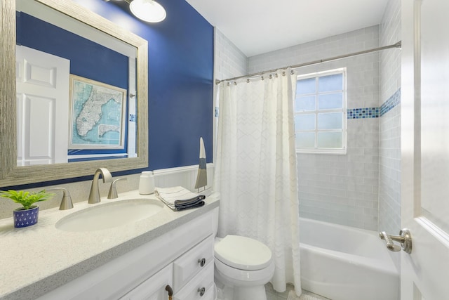 bathroom featuring toilet, vanity, and shower / tub combo with curtain