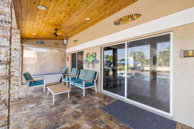 view of patio with a ceiling fan