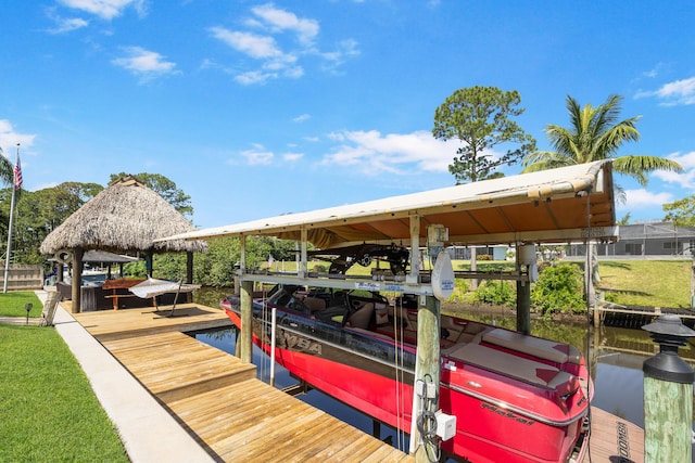 dock area with boat lift and a gazebo