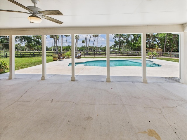2045 SW 18th Ln, Okeechobee, FL 34974 - swimming pool featuring ceiling fan, a fenced backyard, and a patio area