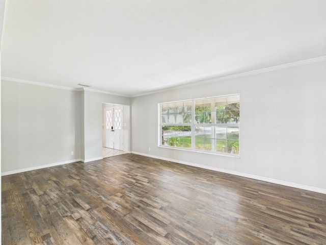 2045 SW 18th Ln, Okeechobee, FL 34974 - unfurnished living room with wood finished floors, crown molding, and baseboards
