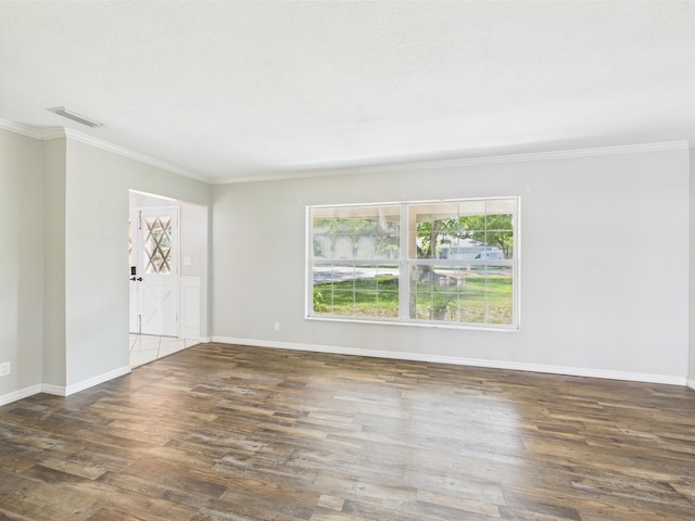 2045 SW 18th Ln, Okeechobee, FL 34974 - unfurnished room with wood finished floors, ornamental molding, and baseboards
