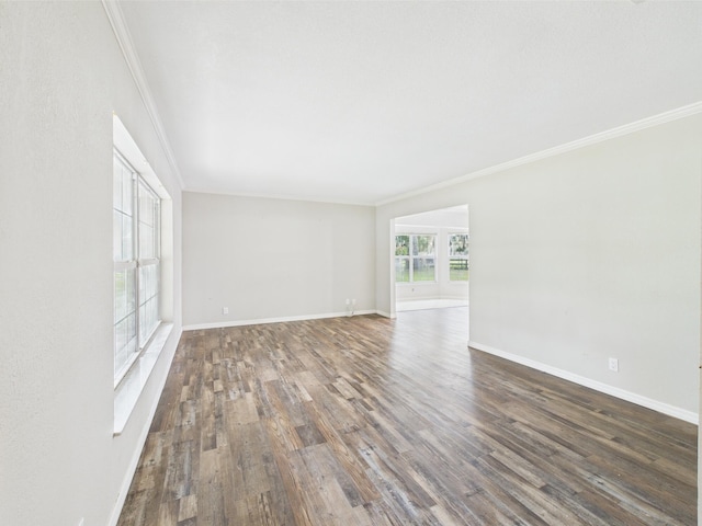 2045 SW 18th Ln, Okeechobee, FL 34974 - empty room with ornamental molding, wood finished floors, and baseboards