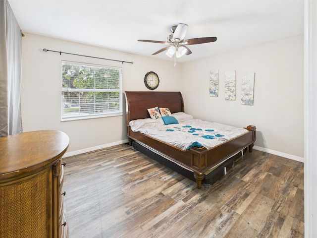 2045 SW 18th Ln, Okeechobee, FL 34974 - bedroom with wood finished floors, baseboards, and ceiling fan